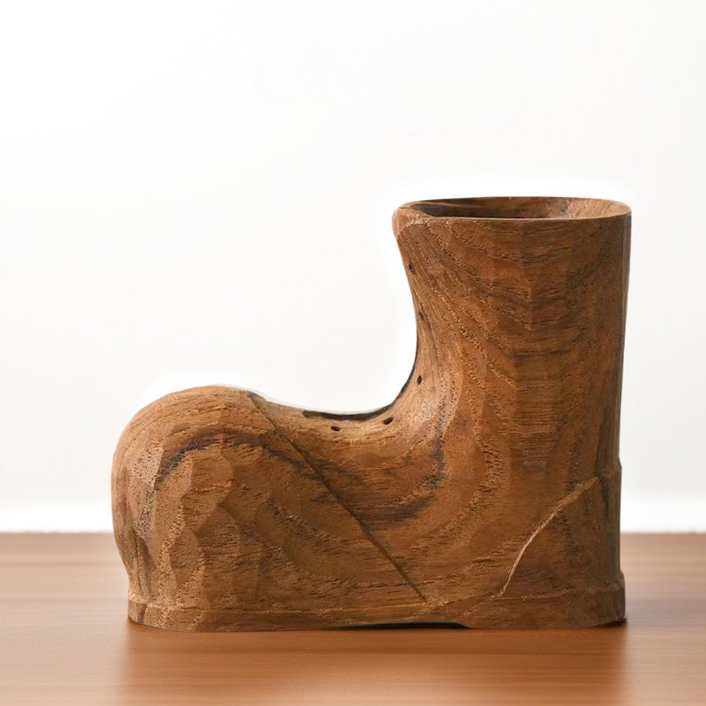 Crafted with meticulous artistry, this hand-carved shoe-shaped pen holder blends whimsical design with functional elegance. Made from sustainably sourced solid wood and finished with a non-toxic beeswax coating, it offers a scratch-resistant surface while maintaining eco-friendly integrity.