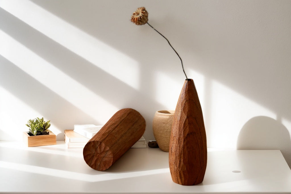 Crafted from ​premium Burmese Teak​ and meticulously hand-carved by skilled artisans, this small decorative vase combines timeless elegance with functional design. Ideal for displaying fresh blooms, dried floral arrangements, or as a standalone decorative accent, it adds a touch of rustic charm to any space while meeting modern sustainability standards