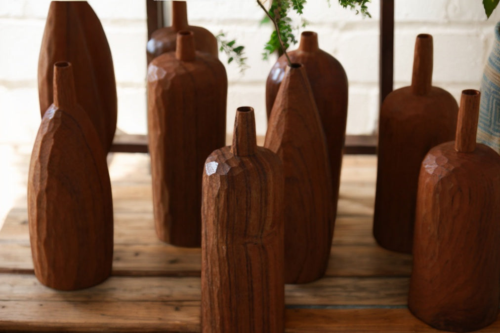 Crafted from ​premium Burmese Teak​ and meticulously hand-carved by skilled artisans, this small decorative vase combines timeless elegance with functional design. Ideal for displaying fresh blooms, dried floral arrangements, or as a standalone decorative accent, it adds a touch of rustic charm to any space while meeting modern sustainability standards