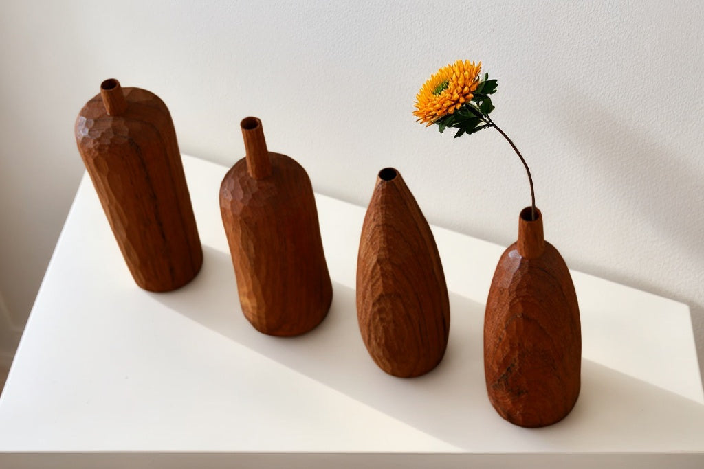 Crafted from ​premium Burmese Teak​ and meticulously hand-carved by skilled artisans, this small decorative vase combines timeless elegance with functional design. Ideal for displaying fresh blooms, dried floral arrangements, or as a standalone decorative accent, it adds a touch of rustic charm to any space while meeting modern sustainability standards