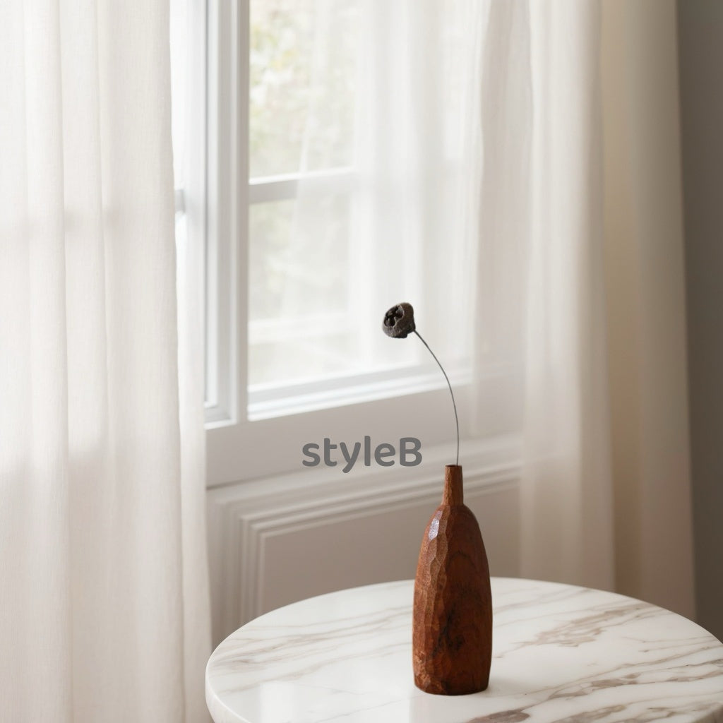 Crafted from ​premium Burmese Teak​ and meticulously hand-carved by skilled artisans, this small decorative vase combines timeless elegance with functional design. Ideal for displaying fresh blooms, dried floral arrangements, or as a standalone decorative accent, it adds a touch of rustic charm to any space while meeting modern sustainability standards