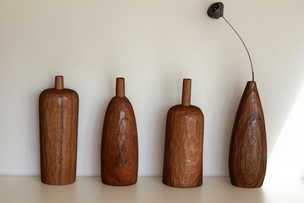 Crafted from ​premium Burmese Teak​ and meticulously hand-carved by skilled artisans, this small decorative vase combines timeless elegance with functional design. Ideal for displaying fresh blooms, dried floral arrangements, or as a standalone decorative accent, it adds a touch of rustic charm to any space while meeting modern sustainability standards