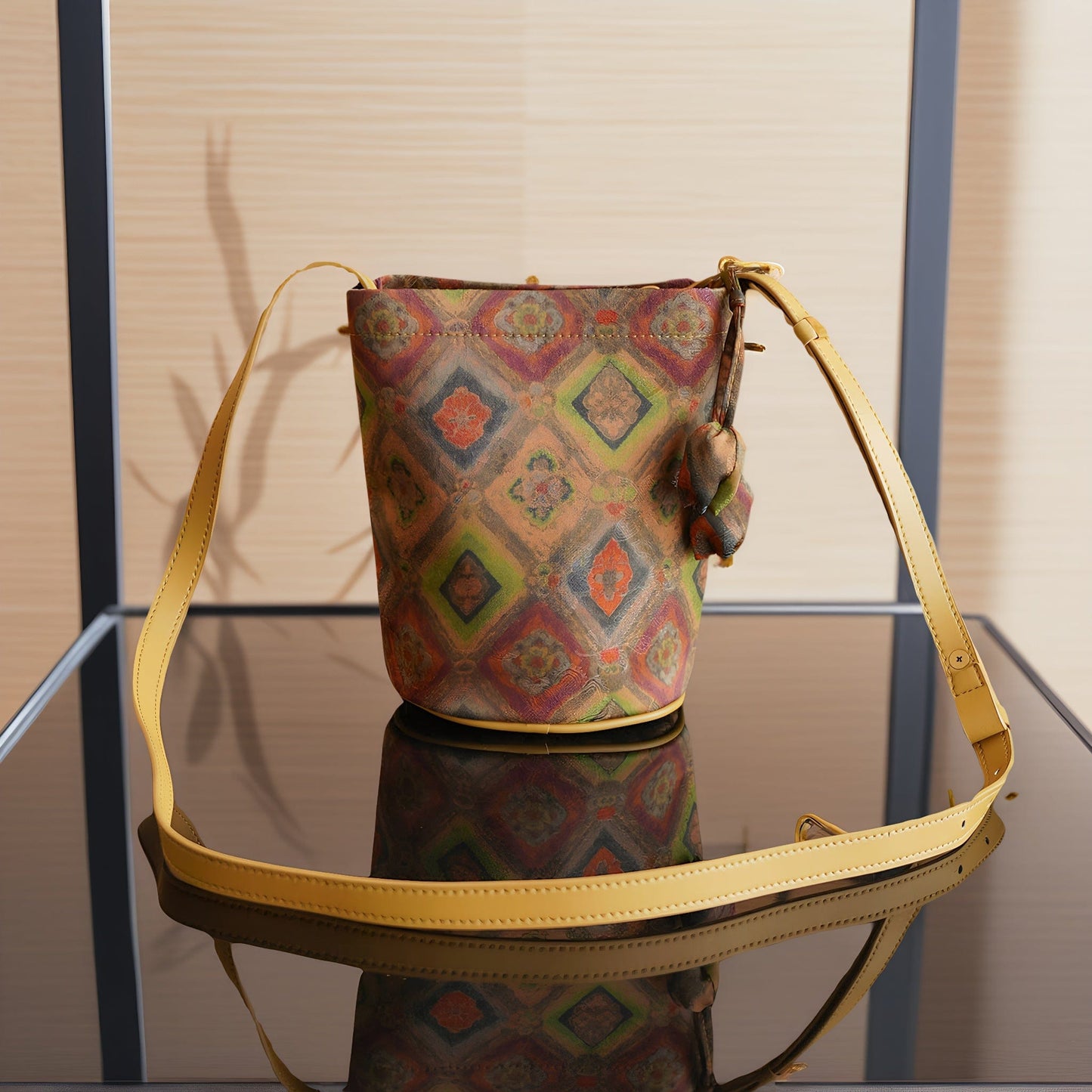 Front view of the Four-Grid Window Pattern Xiangyunsha Silk Vintage Crossbody Bag, showcasing its unique geometric design inspired by traditional Chinese architecture. Crafted from precious ​Xiangyunsha silk​ (Gambiered Guangdong Gauze), a ​Chinese intangible cultural heritage​ fabric known as 'soft gold', this ​vintage-style bag​ features an adjustable strap for comfortable ​crossbody wear, combining ​elegant aesthetics​ with ​everyday practicality.