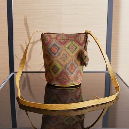 Front view of the Four-Grid Window Pattern Xiangyunsha Silk Vintage Crossbody Bag, showcasing its unique geometric design inspired by traditional Chinese architecture. Crafted from precious ​Xiangyunsha silk​ (Gambiered Guangdong Gauze), a ​Chinese intangible cultural heritage​ fabric known as 'soft gold', this ​vintage-style bag​ features an adjustable strap for comfortable ​crossbody wear, combining ​elegant aesthetics​ with ​everyday practicality.
