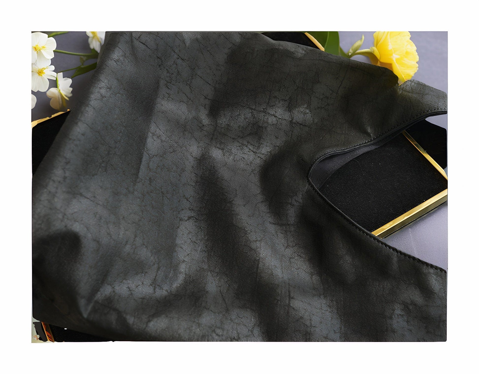 Back view of the Loong Li Xiangyunsha shoulder bag, highlighting its deep and naturally unique texture. The material shimmers with a captivating luster under various lighting conditi.Luxuriously silky​ to the touch, embodying ​elegance and nobility.