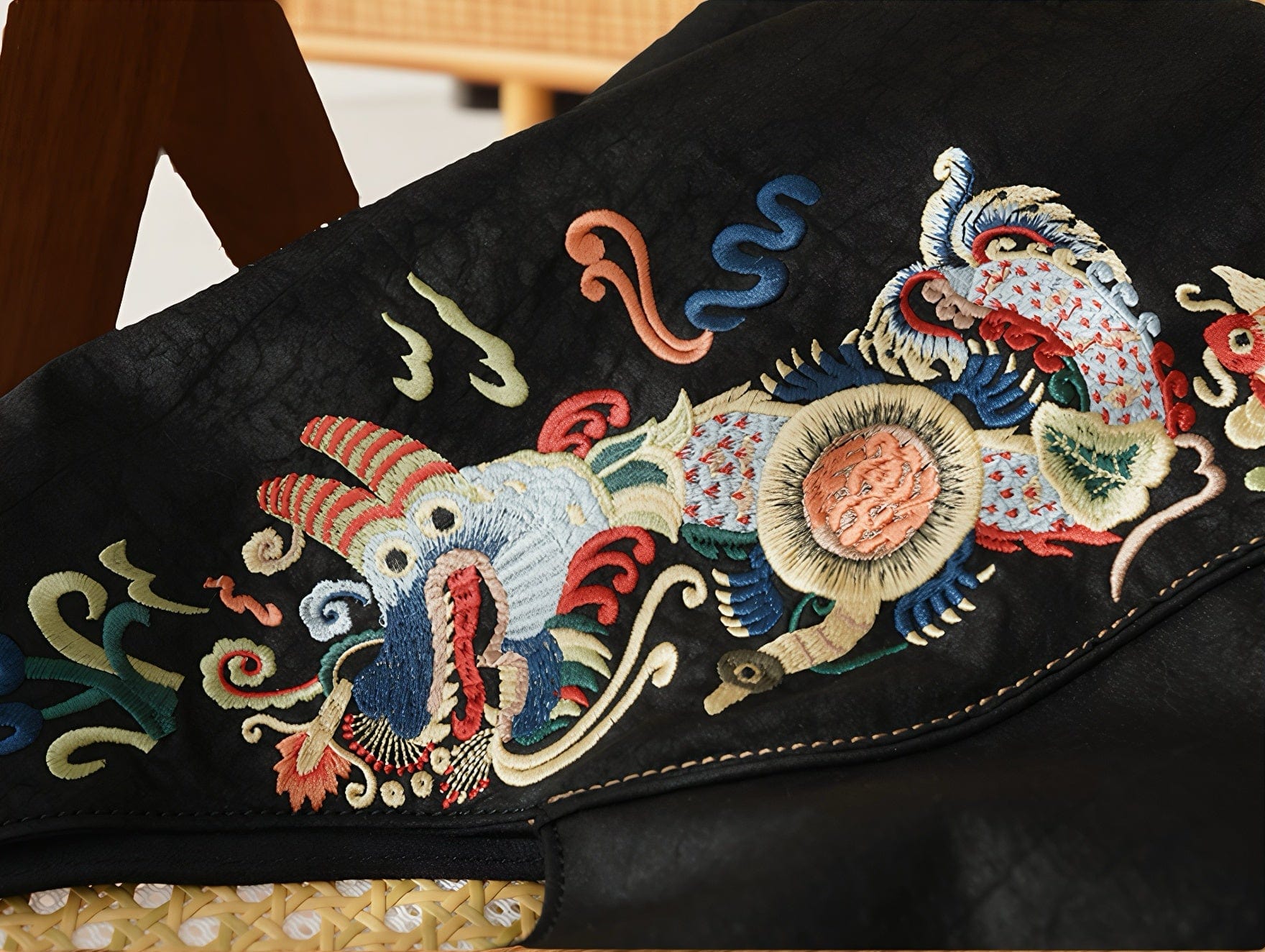 Loong Li Xiangyunsha shoulder bag with luxurious hand-embroidered 'Carp Leaping Over the Loong Gate' pattern. This exquisite craft symbolizes success and good fortune in New Chinese style.